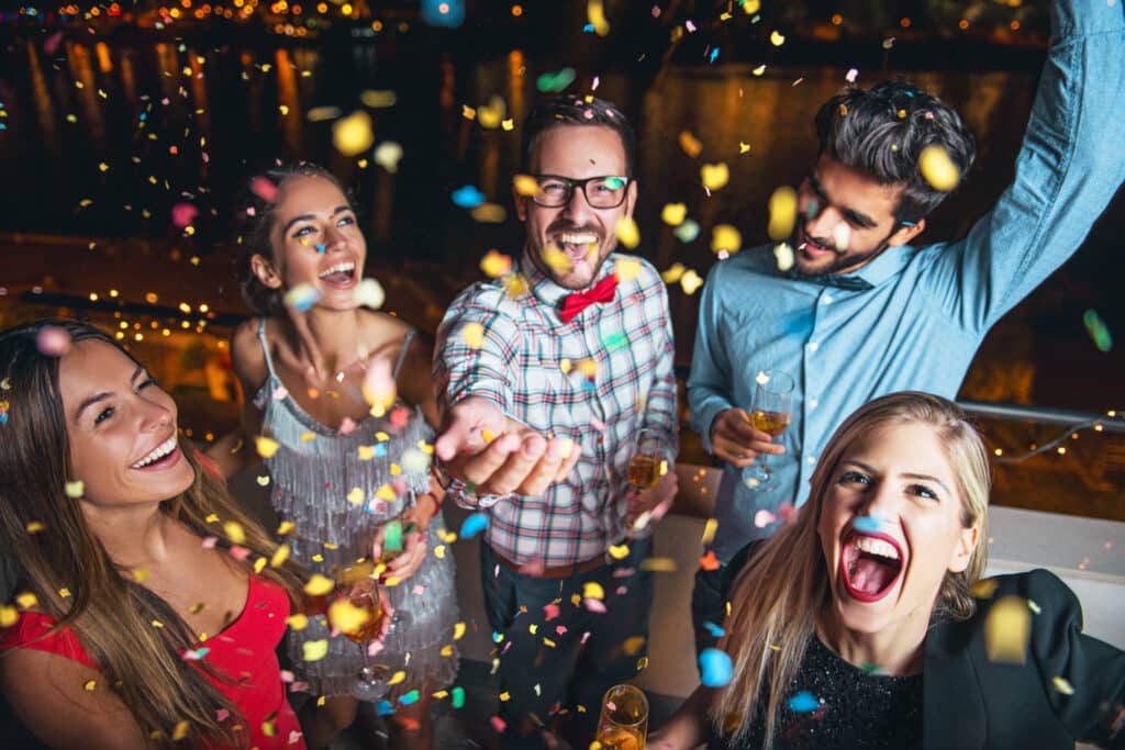 People celebrating at an axe throwing party
